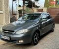 Серый Шевроле Лачетти, объемом двигателя 1.6 л и пробегом 211 тыс. км за 4900 $, фото 1 на Automoto.ua