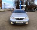 Серый Шевроле Лачетти, объемом двигателя 1.8 л и пробегом 194 тыс. км за 4900 $, фото 2 на Automoto.ua