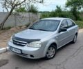 Серый Шевроле Лачетти, объемом двигателя 1.6 л и пробегом 254 тыс. км за 3550 $, фото 1 на Automoto.ua