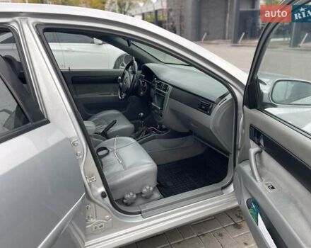 Серый Шевроле Лачетти, объемом двигателя 1.8 л и пробегом 309 тыс. км за 4499 $, фото 12 на Automoto.ua