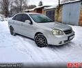 Серый Шевроле Лачетти, объемом двигателя 1.8 л и пробегом 250 тыс. км за 3950 $, фото 1 на Automoto.ua