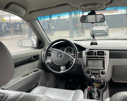 Серый Шевроле Лачетти, объемом двигателя 1.8 л и пробегом 309 тыс. км за 4499 $, фото 14 на Automoto.ua