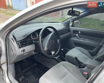 Серый Шевроле Лачетти, объемом двигателя 1.8 л и пробегом 294 тыс. км за 3900 $, фото 12 на Automoto.ua