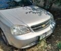 Серый Шевроле Лачетти, объемом двигателя 1.8 л и пробегом 430 тыс. км за 2100 $, фото 1 на Automoto.ua