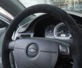 Серый Шевроле Лачетти, объемом двигателя 1.8 л и пробегом 220 тыс. км за 4999 $, фото 1 на Automoto.ua