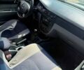 Серый Шевроле Лачетти, объемом двигателя 1.8 л и пробегом 220 тыс. км за 3000 $, фото 2 на Automoto.ua