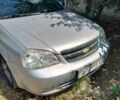 Серый Шевроле Лачетти, объемом двигателя 1.8 л и пробегом 420 тыс. км за 2301 $, фото 1 на Automoto.ua