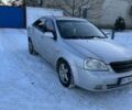 Серый Шевроле Лачетти, объемом двигателя 1.8 л и пробегом 260 тыс. км за 2800 $, фото 1 на Automoto.ua