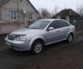 Сірий Шевроле Лачетті, об'ємом двигуна 1.8 л та пробігом 295 тис. км за 3300 $, фото 1 на Automoto.ua