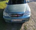Серый Шевроле Лачетти, объемом двигателя 1.8 л и пробегом 213 тыс. км за 3800 $, фото 1 на Automoto.ua