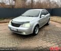 Серый Шевроле Лачетти, объемом двигателя 1.6 л и пробегом 205 тыс. км за 3650 $, фото 1 на Automoto.ua