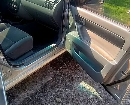 Серый Шевроле Лачетти, объемом двигателя 1.8 л и пробегом 298 тыс. км за 2250 $, фото 2 на Automoto.ua