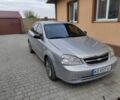 Серый Шевроле Лачетти, объемом двигателя 1.6 л и пробегом 352 тыс. км за 4017 $, фото 1 на Automoto.ua