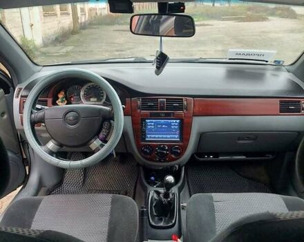 Серый Шевроле Лачетти, объемом двигателя 1.8 л и пробегом 318 тыс. км за 3900 $, фото 7 на Automoto.ua