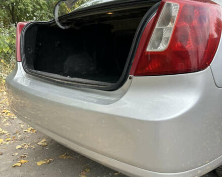 Серый Шевроле Лачетти, объемом двигателя 1.6 л и пробегом 255 тыс. км за 3600 $, фото 39 на Automoto.ua