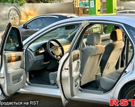 Серый Шевроле Лачетти, объемом двигателя 1.6 л и пробегом 253 тыс. км за 4999 $, фото 6 на Automoto.ua