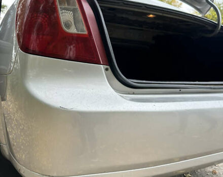 Серый Шевроле Лачетти, объемом двигателя 1.6 л и пробегом 255 тыс. км за 3600 $, фото 40 на Automoto.ua