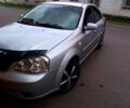 Серый Шевроле Лачетти, объемом двигателя 1.8 л и пробегом 325 тыс. км за 2600 $, фото 1 на Automoto.ua