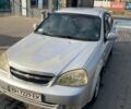 Серый Шевроле Лачетти, объемом двигателя 1.8 л и пробегом 198 тыс. км за 2000 $, фото 1 на Automoto.ua
