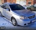 Серый Шевроле Лачетти, объемом двигателя 1.8 л и пробегом 258 тыс. км за 3900 $, фото 1 на Automoto.ua