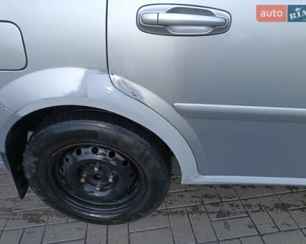 Серый Шевроле Лачетти, объемом двигателя 1.8 л и пробегом 459 тыс. км за 2999 $, фото 3 на Automoto.ua