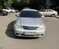 Серый Шевроле Лачетти, объемом двигателя 1.8 л и пробегом 330 тыс. км за 2996 $, фото 1 на Automoto.ua