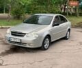 Серый Шевроле Лачетти, объемом двигателя 1.6 л и пробегом 350 тыс. км за 3300 $, фото 1 на Automoto.ua