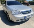 Сірий Шевроле Лачетті, об'ємом двигуна 1.8 л та пробігом 224 тис. км за 4900 $, фото 1 на Automoto.ua