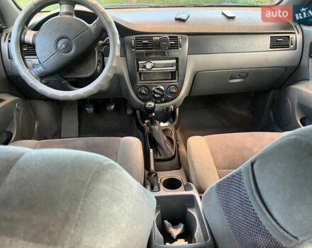 Серый Шевроле Лачетти, объемом двигателя 1.6 л и пробегом 315 тыс. км за 3900 $, фото 4 на Automoto.ua