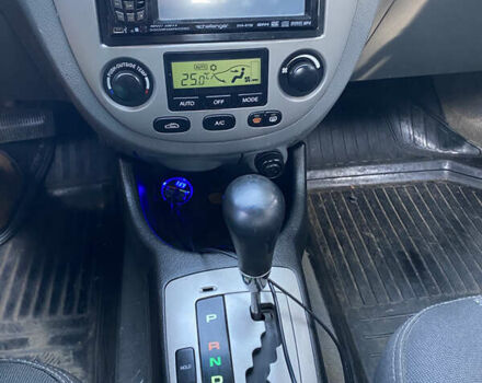 Сірий Шевроле Лачетті, об'ємом двигуна 1.8 л та пробігом 295 тис. км за 3900 $, фото 10 на Automoto.ua