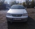 Серый Шевроле Лачетти, объемом двигателя 1.8 л и пробегом 220 тыс. км за 4106 $, фото 1 на Automoto.ua