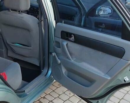 Сірий Шевроле Лачетті, об'ємом двигуна 1.8 л та пробігом 250 тис. км за 4100 $, фото 12 на Automoto.ua