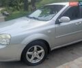 Серый Шевроле Лачетти, объемом двигателя 1.8 л и пробегом 400 тыс. км за 3500 $, фото 1 на Automoto.ua