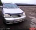 Серый Шевроле Лачетти, объемом двигателя 1.8 л и пробегом 243 тыс. км за 4650 $, фото 1 на Automoto.ua