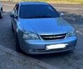 Серый Шевроле Лачетти, объемом двигателя 1.8 л и пробегом 390 тыс. км за 3650 $, фото 1 на Automoto.ua