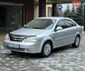 Серый Шевроле Лачетти, объемом двигателя 1.8 л и пробегом 240 тыс. км за 3999 $, фото 1 на Automoto.ua