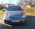 Серый Шевроле Лачетти, объемом двигателя 1.8 л и пробегом 260 тыс. км за 3100 $, фото 1 на Automoto.ua