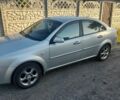 Серый Шевроле Лачетти, объемом двигателя 1.8 л и пробегом 254 тыс. км за 3900 $, фото 1 на Automoto.ua