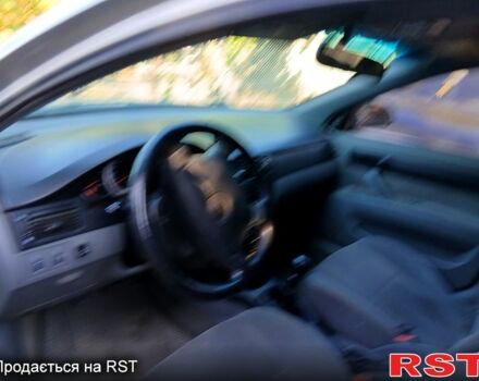 Серый Шевроле Лачетти, объемом двигателя 1.6 л и пробегом 235 тыс. км за 3450 $, фото 2 на Automoto.ua