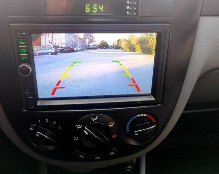 Сірий Шевроле Лачетті, об'ємом двигуна 1.8 л та пробігом 240 тис. км за 4600 $, фото 12 на Automoto.ua