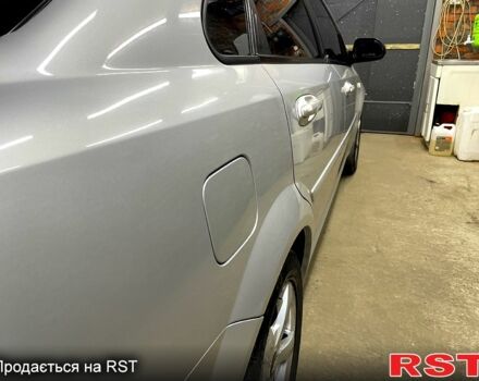 Серый Шевроле Лачетти, объемом двигателя 1.6 л и пробегом 292 тыс. км за 3800 $, фото 2 на Automoto.ua