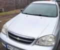 Серый Шевроле Лачетти, объемом двигателя 1.6 л и пробегом 230 тыс. км за 4500 $, фото 1 на Automoto.ua