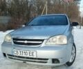Серый Шевроле Лачетти, объемом двигателя 1.6 л и пробегом 253 тыс. км за 2700 $, фото 1 на Automoto.ua