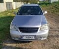 Серый Шевроле Лачетти, объемом двигателя 1.8 л и пробегом 235 тыс. км за 3948 $, фото 1 на Automoto.ua