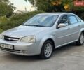 Сірий Шевроле Лачетті, об'ємом двигуна 1.8 л та пробігом 267 тис. км за 4499 $, фото 1 на Automoto.ua