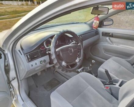 Серый Шевроле Лачетти, объемом двигателя 1.6 л и пробегом 270 тыс. км за 4950 $, фото 1 на Automoto.ua