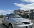 Серый Шевроле Лачетти, объемом двигателя 1.8 л и пробегом 150 тыс. км за 4600 $, фото 1 на Automoto.ua