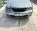 Серый Шевроле Лачетти, объемом двигателя 1.8 л и пробегом 236 тыс. км за 4800 $, фото 1 на Automoto.ua