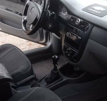 Серый Шевроле Лачетти, объемом двигателя 1.6 л и пробегом 210 тыс. км за 5200 $, фото 12 на Automoto.ua