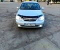 Серый Шевроле Лачетти, объемом двигателя 1.6 л и пробегом 170 тыс. км за 5000 $, фото 1 на Automoto.ua